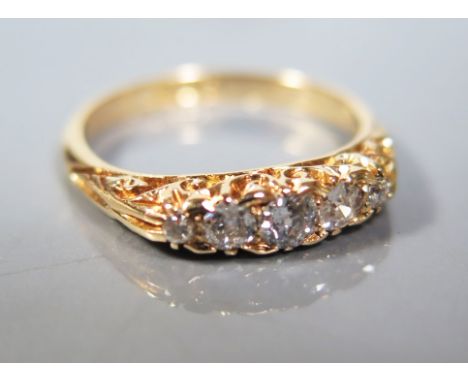 An 18ct Gold and Diamond Five Stone Ring, size M, 3.5 g