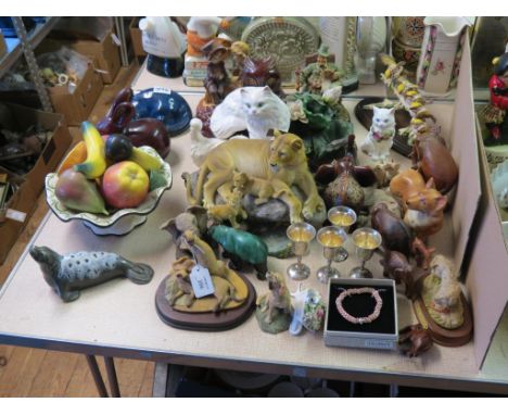 A collection of animal models, largely ceramic, including Beswick cat 