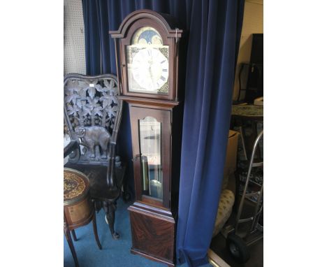 A period-style grandmother clock, arched dial with moon phase, glazed trunk door enclosing brass weights and pendulum, 5ft. 6