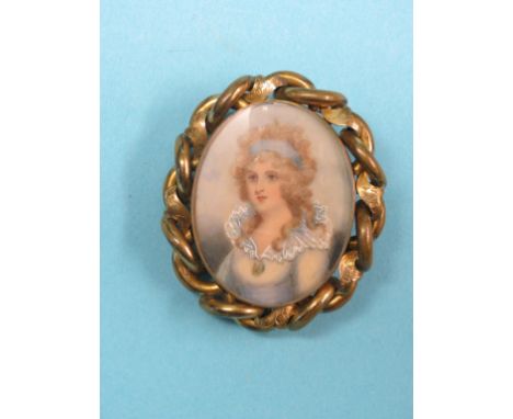 A Victorian pinchbeck brooch, oval twist form with inset portrait miniature, young female
