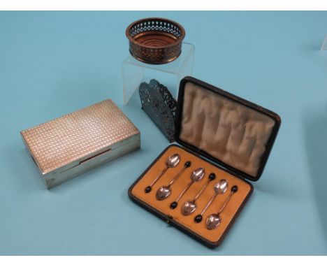 An engine-turned silver cigarette case, 6.5in. - inscribed, a cased set of six silver coffee spoons, plated coaster and a Dan