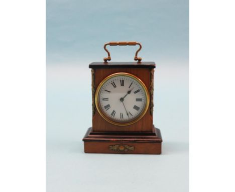 A 19th century walnut mantel clock, with convex enamelled dial and French timepiece movement, case with applied brass mounts 