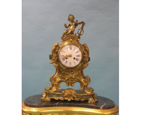 A late 19th century ormolu mantel clock in Louis XV-style, convex enamelled dial and 8-day bell-striking movement, case elabo