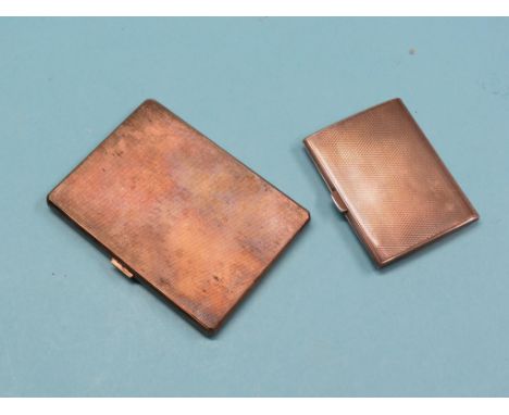 Two engine-turned silver cigarette cases, approx. 8.25oz. total