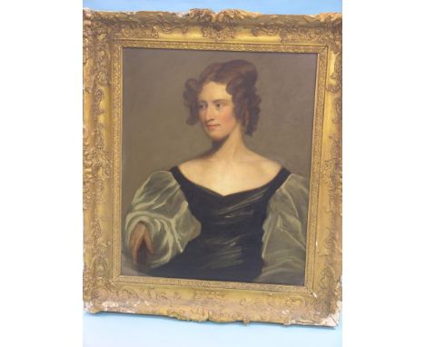 A mid-19th century oil on canvas - half-length portrait of a lady, evening dress, unsigned, 30 x 24in.