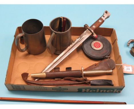 Two silver-mounted riding crops, a bayonet and two daggers, two large padlocks, etc. 