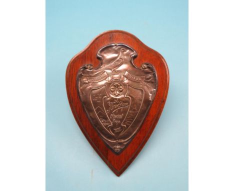 The Homing Pigeon National Shield of Merit, Special Prize, 1911, silver embossed in Art Nouveau-style, on oak shield-shape pl