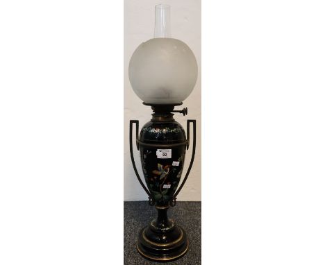 Early 20th Century ceramic two handled vase shaped oil lamp with enamelled decoration of birds amongst flowers on a pedestal 
