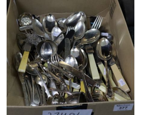 Box of loose plated and other cutlery and kitchenalia including; butter knives, egg cup, nutcracker, scissors, various spoons