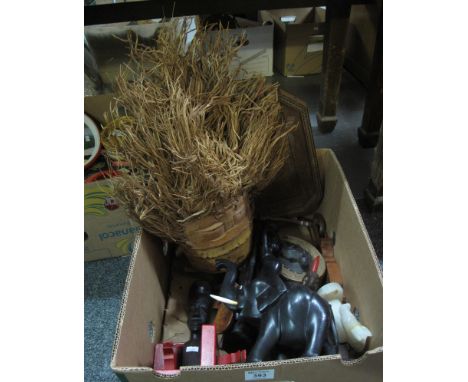 Box of mostly treen items to include; bookends, carved bamboo mask head, tumbridge ware tray, African carved figures, Welsh l
