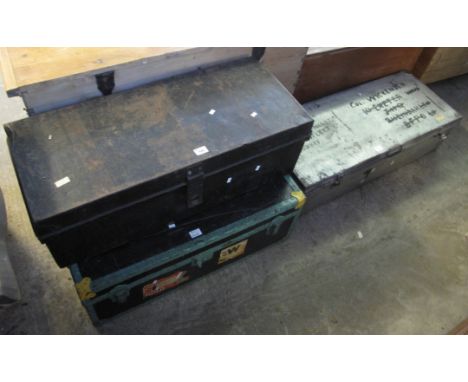 Three vintage travelling tin trunks, some with labels and text. (3)(B.P. 24% incl. VAT) 