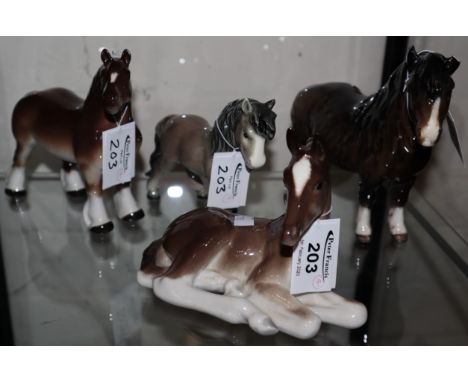 Two Russian USSR ceramic horses, together with a Goebel horse and another. (4) (B.P. 24% incl. VAT)