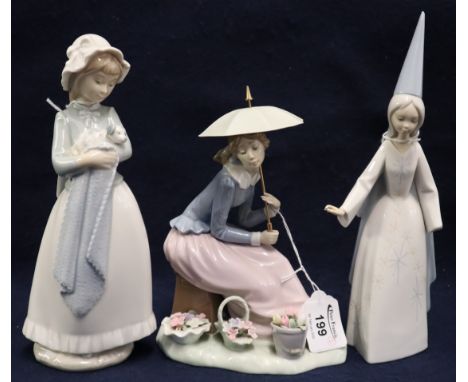 Two Nao Spanish porcelain figurines, one with umbrella, together with another Lladro Spanish porcelain figurine.(B.P. 24% inc