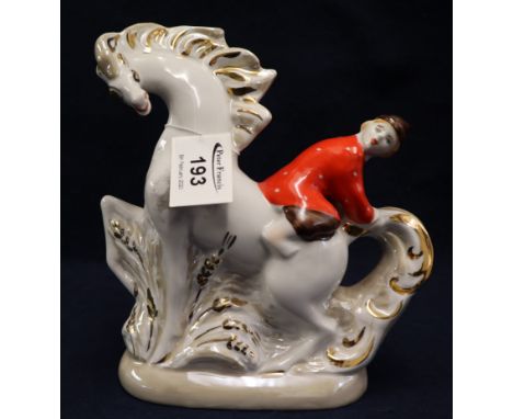 Continental ceramic figurine of a stylised horse and rider, possibly Russian.(B.P. 24% incl. VAT)