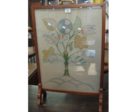 20th Century fire screen, the panel with embroidered floral decoration.(B.P. 24% incl. VAT)