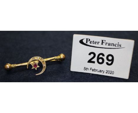 9ct gold Edwardian bar brooch set with seed pearls and a ruby (seven seed pearls missing). 2.6g approx. (B.P. 24% incl. VAT)