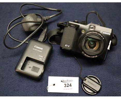 Canon G1X digital camera with charger and shoulder strap.(B.P. 24% incl. VAT)