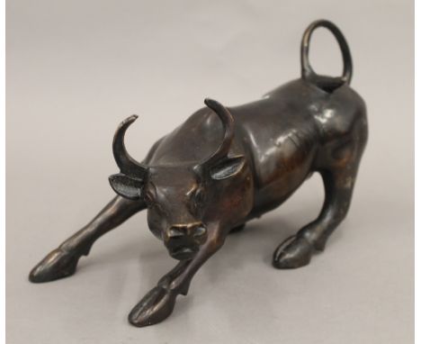 A bronze model of a bull. 30 cm long.