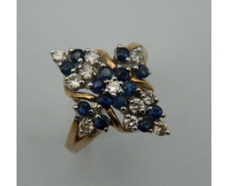 A 9 K gold diamond and sapphire ring. Ring Size M/N.