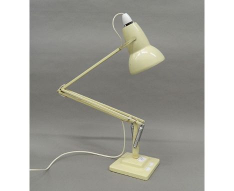 An angle poise lamp. 87.5 cm high.