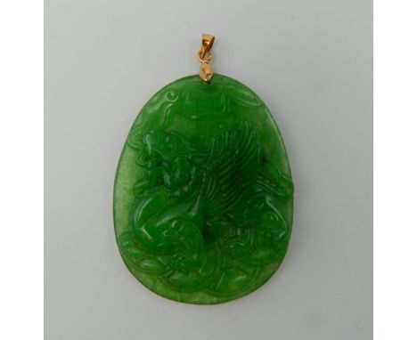 A Chinese carved jade pendant. 5.5 cm high.