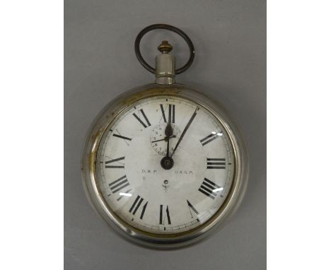 A late 19th/early 20th century alarm clock formed as a large pocket watch. 14.5 cm diameter.