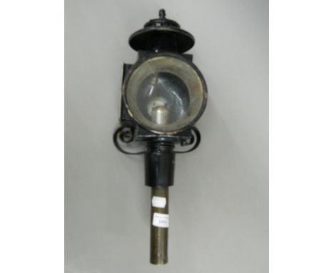 An antique carriage lamp marked Wendover-Huntingdon and London, converted to electricity with a later bracket. 47 cm high.