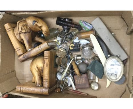 A quantity of miscellaneous items, including corkscrews, vintage buttons, bookends, etc.