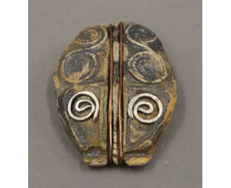 A Celtic style brooch, in original box. 5 cm high.