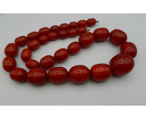 A string of large vintage amber beads. 67 cm long. 