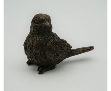 A small bronze model of a bird. 3.5 cm high.