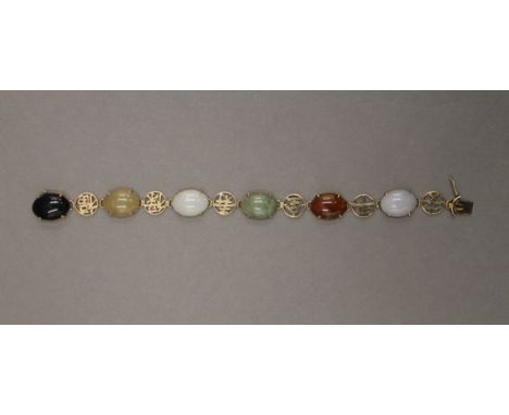 A Chinese 14 K gold and agate bracelet. 18.5 cm long. 16.3 grammes total weight.