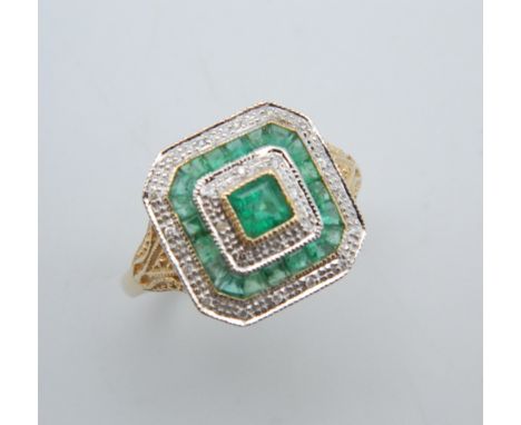 A 9 ct gold Art Deco style emerald and diamond ring. Ring size Q/R.