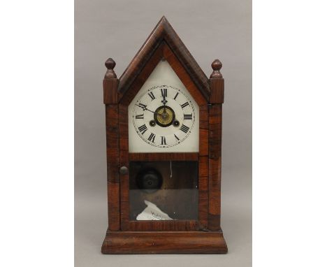 A rosewood mantle clock. 39.5 cm high.