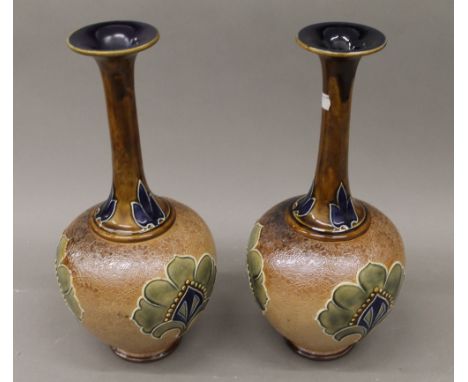 A pair of Art Nouveau Royal Doulton vases. 40 cm high.