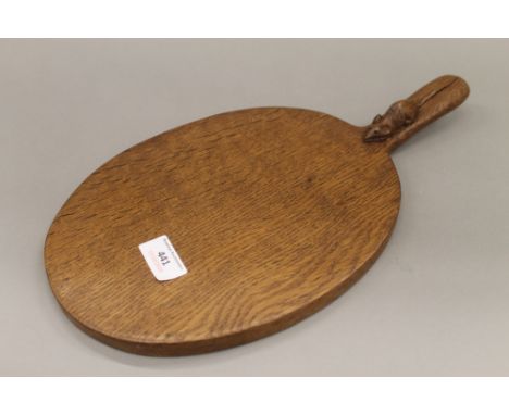 A Mouseman cheeseboard. 39.5 cm long.