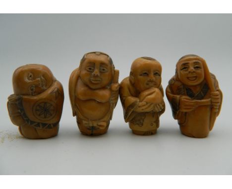Four carved bone netsuke. Each approximately 3.5 cm high.