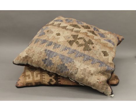 A pair of vintage Kilim cushions. Each approximately 40 cm wide.