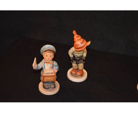 Two Hummel Figurines 'The Postman' and 'Boy with Scarf'