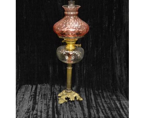 A Brass Based Oil Lamp, Clear Glass Bowl and Shade