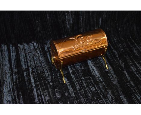 An Arts and Crafts Copper and Brass Tea Caddy 