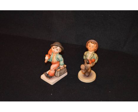 Two Hummel Figurines 'Boy with Case' and 'Boy with Umbrella'