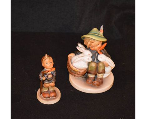 Two Hummel Figurines 'Boy with Rabbits' and 'The Hiker'