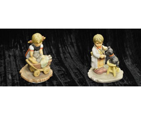 Two Hummel Figurines 'Snuggle Up' and 'The Doctors In'