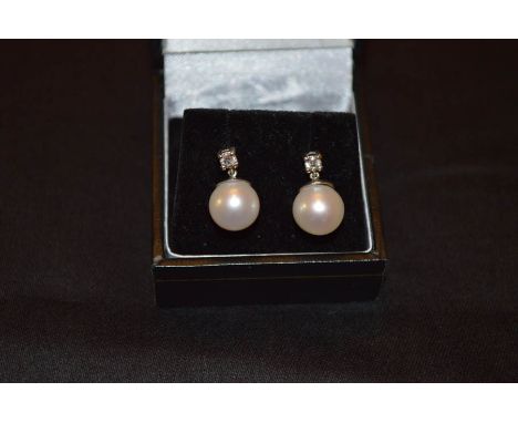 An 18ct Pearl and Diamond Set Earrings 