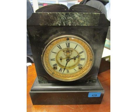 A Victorian black slate and marble mantle clock with white enamelled Roman dial with visible balance wheel 