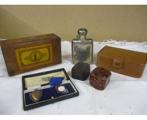 An inlaid mahogany collection box, a silver hip flask, two silver medals to include a 1937 Independent Order of Odd Fellows m