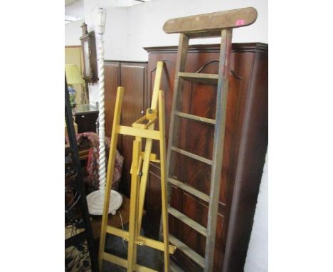 An early 20th century ladder and beech easel 