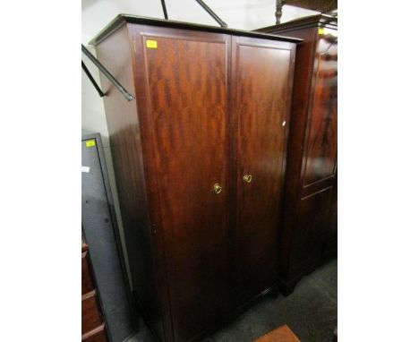 A contemporary mahogany single wardrobe with twin arched and fielded doors on bracket feet, a Stag mahogany wardrobe and a mo
