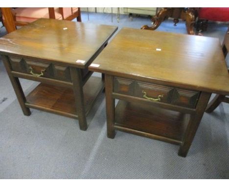 A pair of reproduction refectory style oak lamp tables, with single drawer above lower shelf 